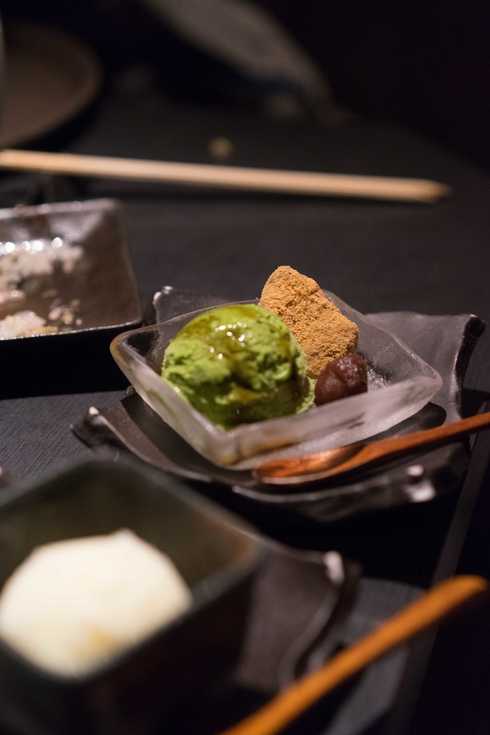 Green tea ice cream with soy covered mochi, and red bean paste! 