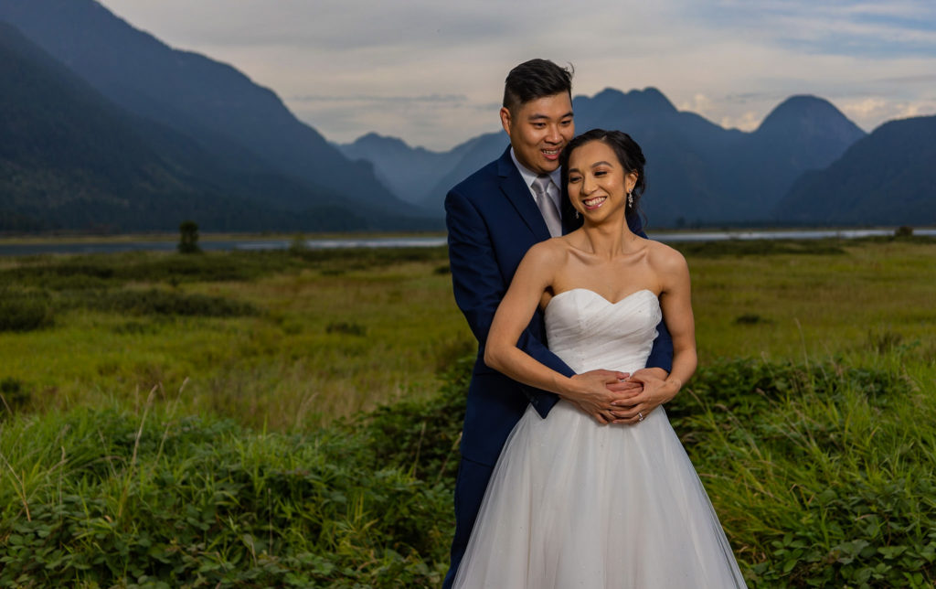 Bride and groom at Pitt Lake for wedding photos
