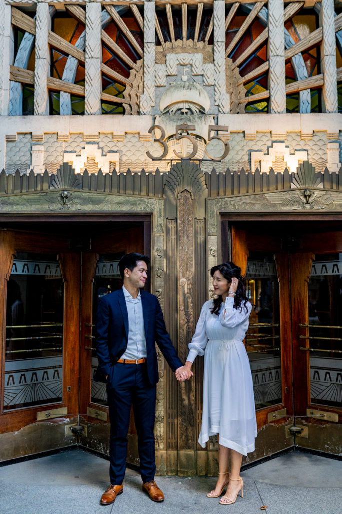 couple in front of the Marine building for their engagement session