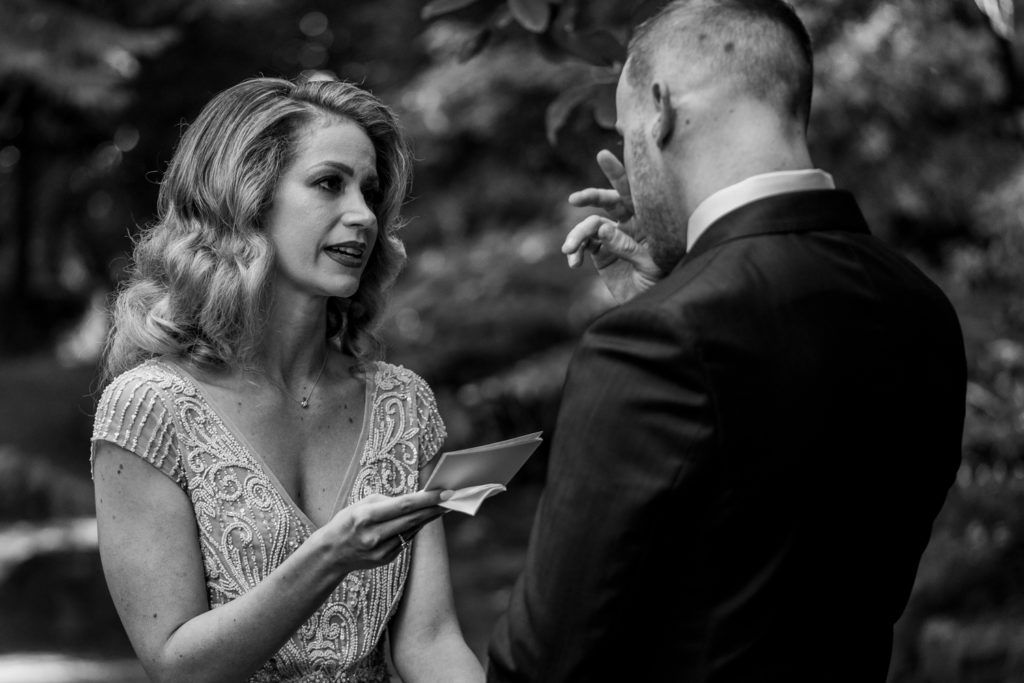Bride sharing vows during Stanley Park elopement