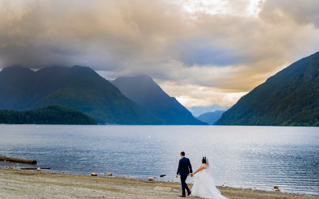 wedding couple walking along Alouette Lake