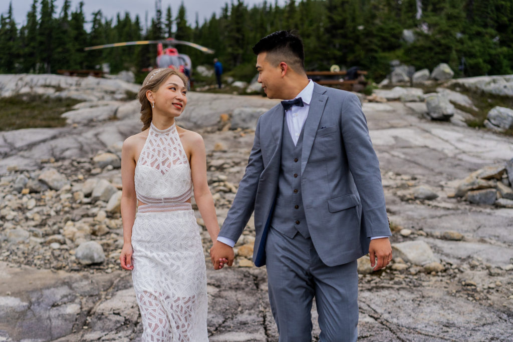 couple walking after their wedding at Beverley Lake in Whistler