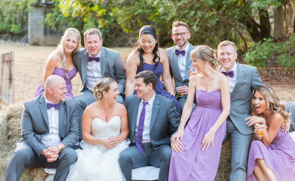 bridal party laughing during their group photos in Cowichan Bay 