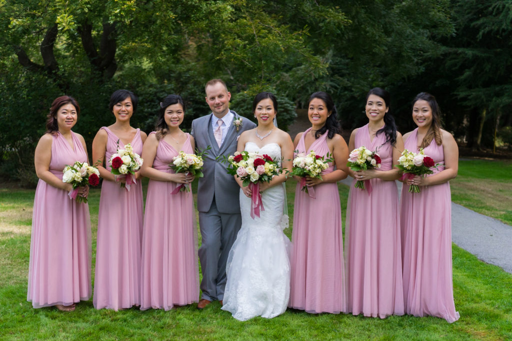 bridesmaids with bride and groom
