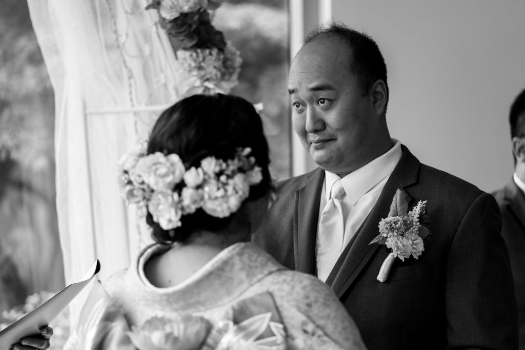 Groom crying as he see's his bride for the first time 