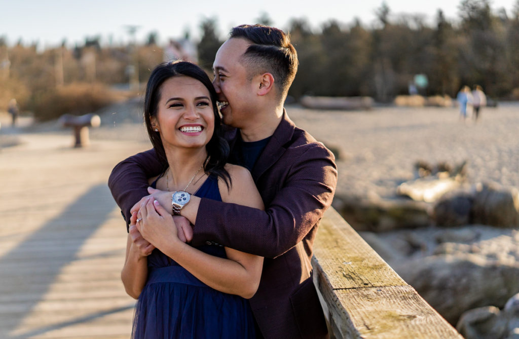 couple posing on the pier during their Jericho engagement session