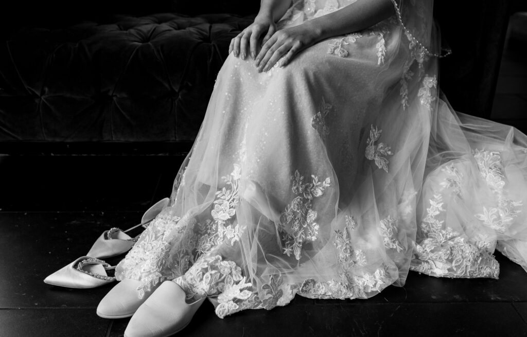 brides shoes and wedding dress 