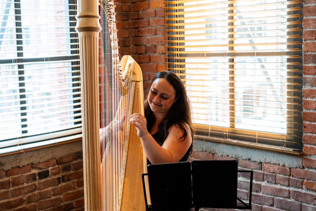 Harpist playing during wedding ceremony 