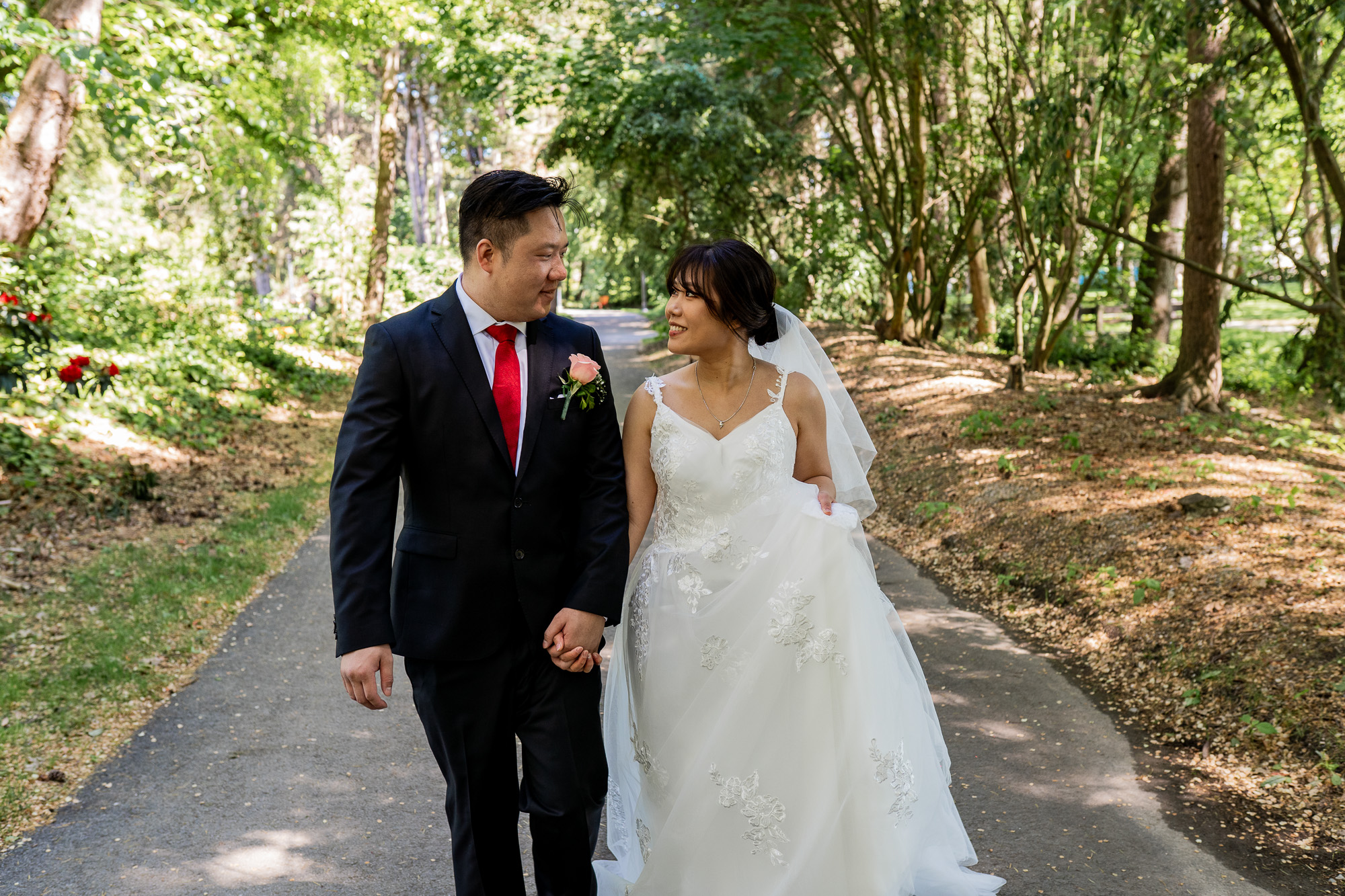 couple walking after their ceremony at Minoru Park